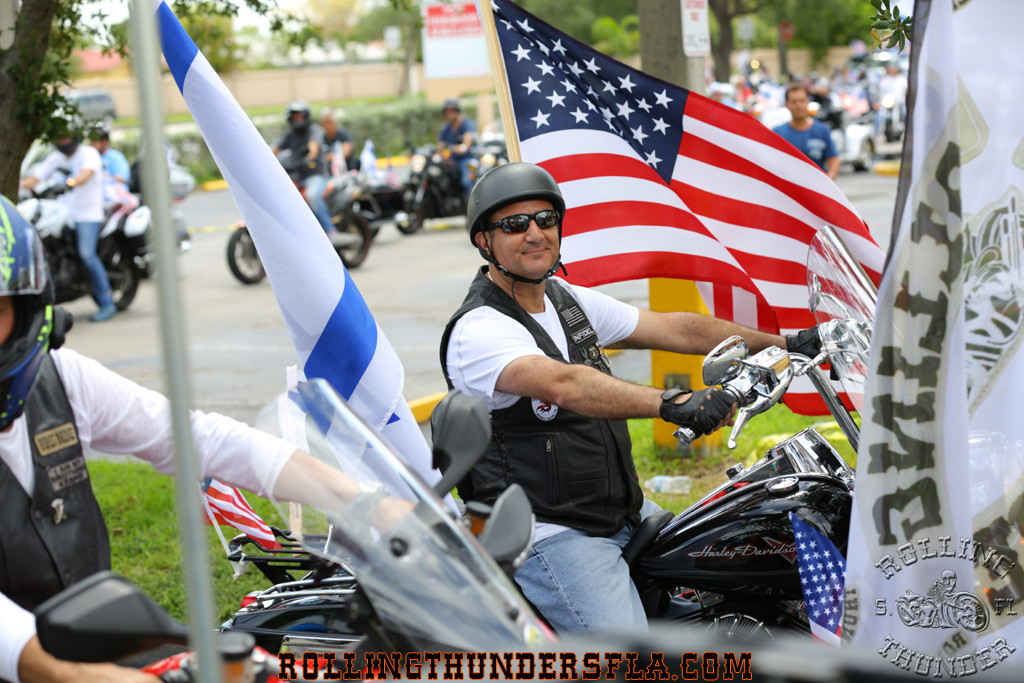 Gil Raz riding a Harley-Davidson motorcycle before suffering a massive stroke in 2019